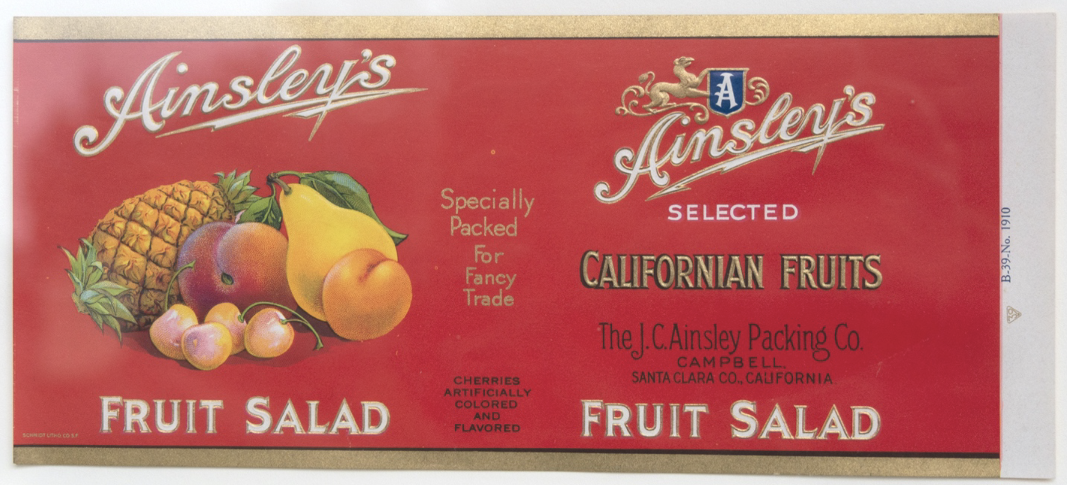 Vintage red Ainsley's Fruit label with pictures of fruit. 